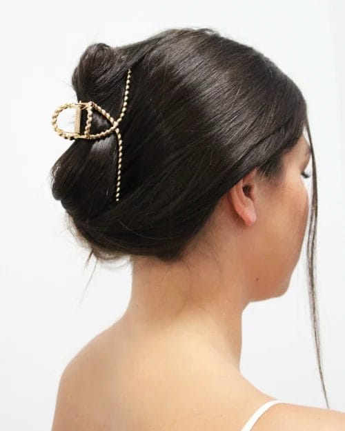 Banded Gold Lasso Clip in model's hair