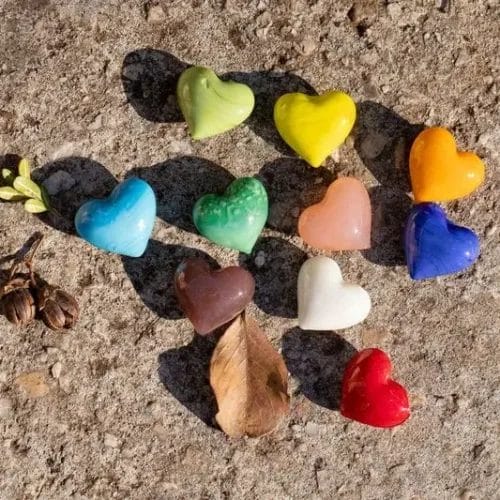 Colorful heart-shaped glass stones.