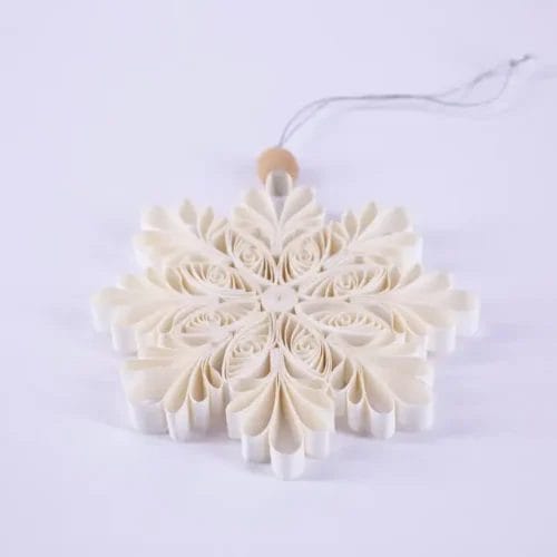 White paper snowflake Christmas ornament.