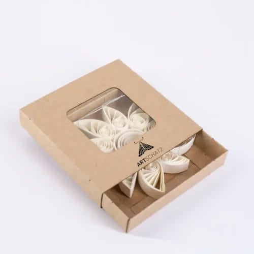 Paper flower ornament in kraft box.