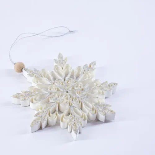 Silver and white paper snowflake ornament.