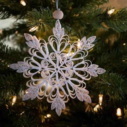 Silver quilled paper snowflake ornament.