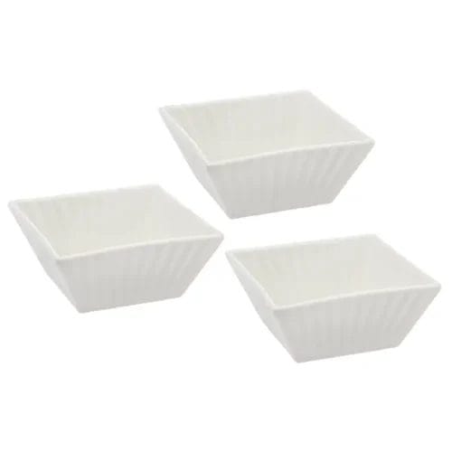 Three white square porcelain bowls.