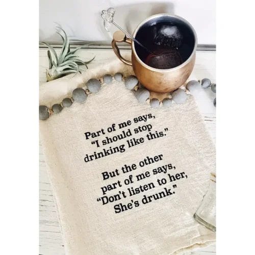 Funny drinking quote on kitchen towel.