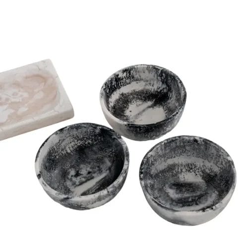 Three marble bowls and a tray.