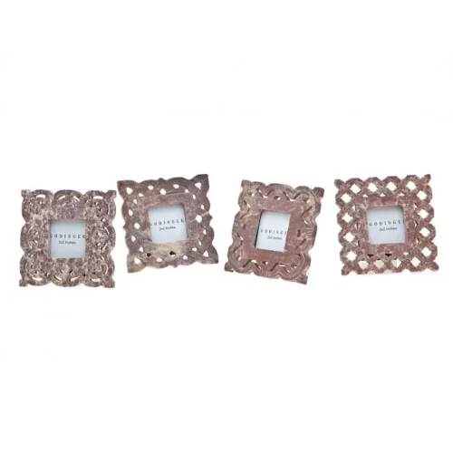 Set of three carved stone picture frames.